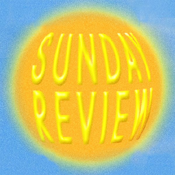 Masked Björk singing into a microphone